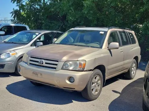 Gold Toyota Highlander waiting for scrap car removal in Coquitlam